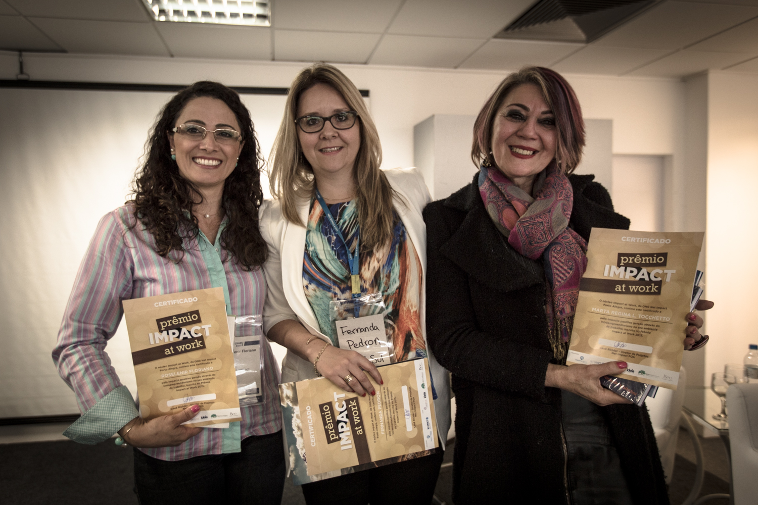Impact at Work Award Winners Rose, Fernanda, and Marta